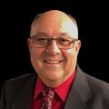 Headshot of Macomb Township Trustee, Charlie Oliver
