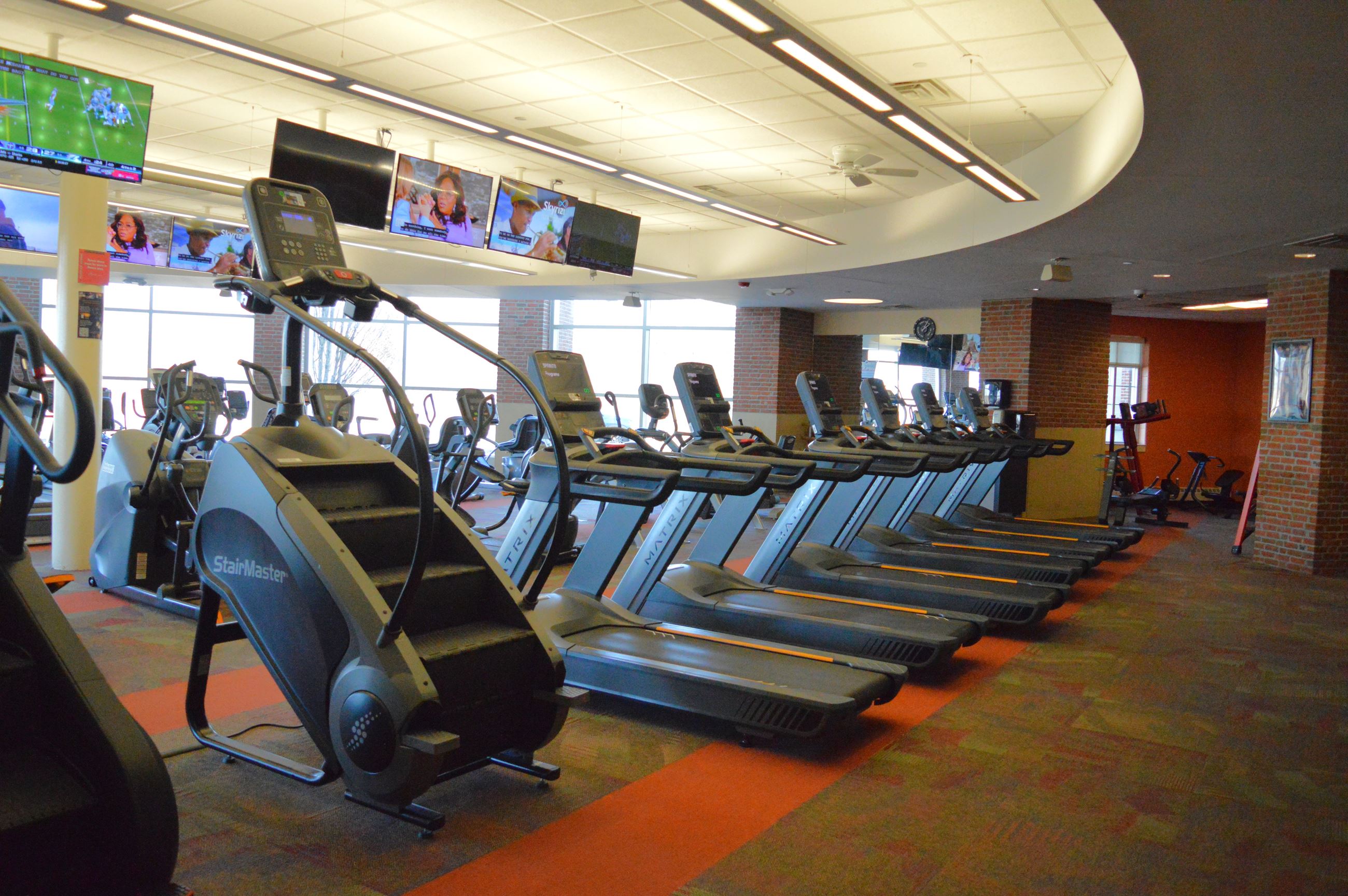 A row of treadmills at the Parks and Recreation Fitness room 